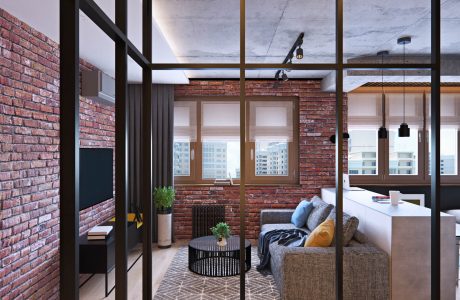 Exposed brick walls, steel-framed windows, and a cozy living area with modern furnishings.