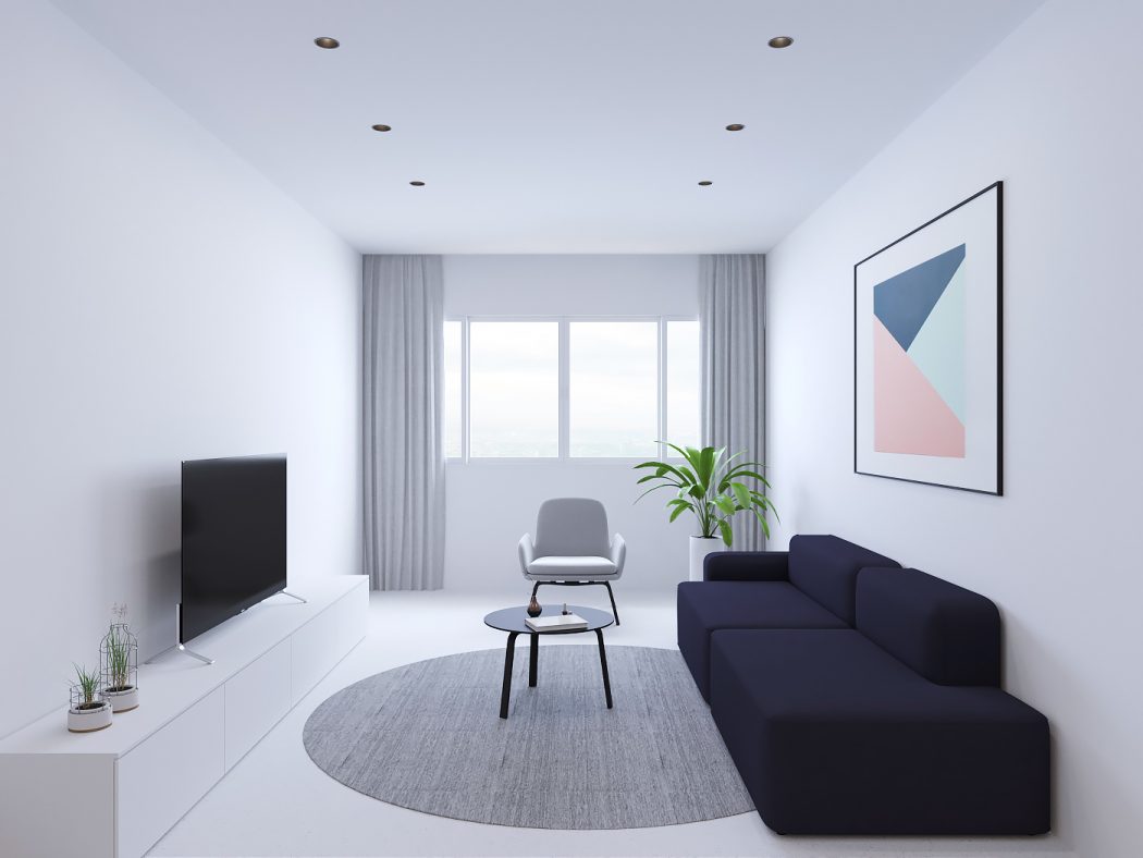 A modern, minimalist living room with a navy blue sofa, gray armchair, and geometric artwork.