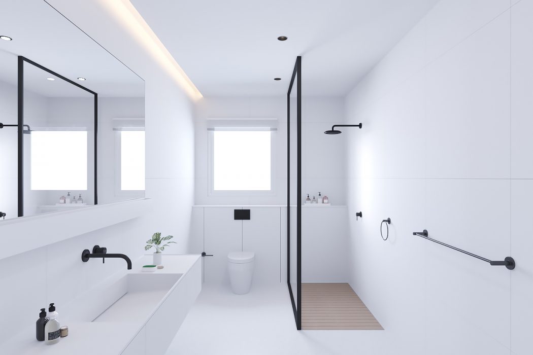 A sleek, minimalist bathroom with clean lines, modern fixtures, and indirect lighting.