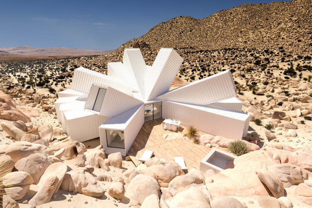 Striking white desert architecture with intricately angled exterior panels and private interior spaces.