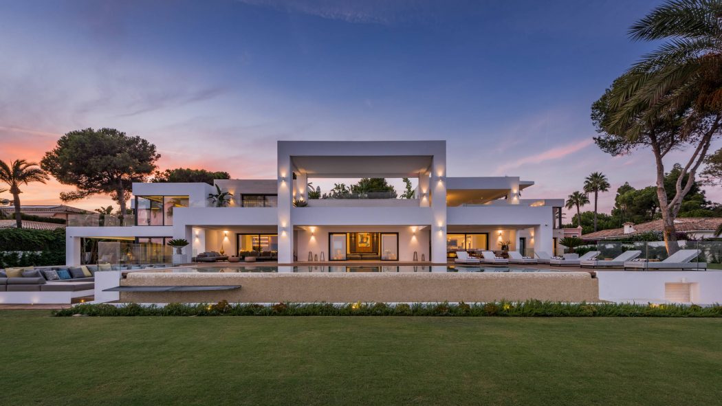 Exquisite modern villa with clean lines, spacious layout, and lavish outdoor amenities.