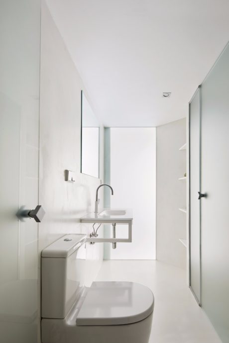 Minimalist bathroom with clean lines, modern fixtures, and a sleek, contemporary design.