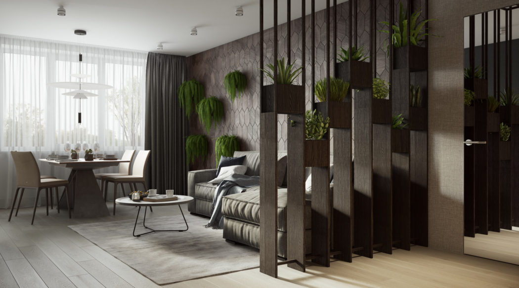 A modern open-plan living area with geometric wall paneling, lush greenery, and sleek furnishings.