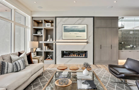 Contemporary living room with fireplace and elegant furnishings