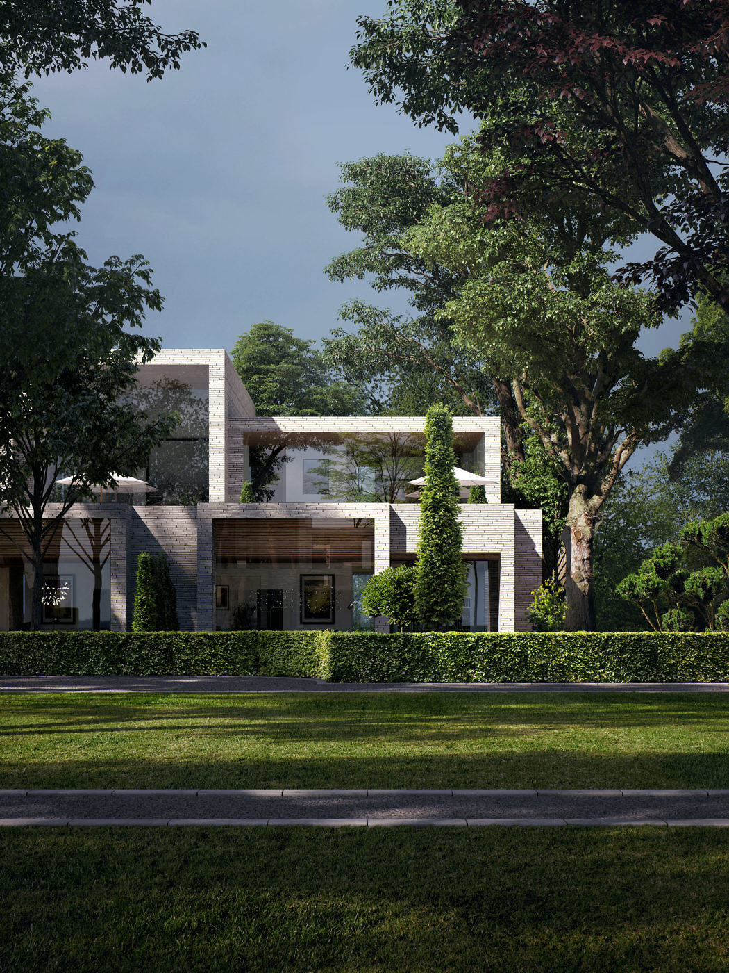 Contemporary home with clean lines, surrounded by lush greenery.