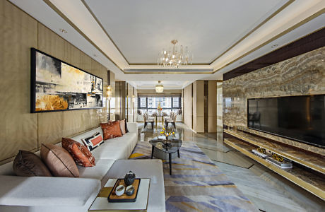 Elegant living room with marble accents and chic decor.