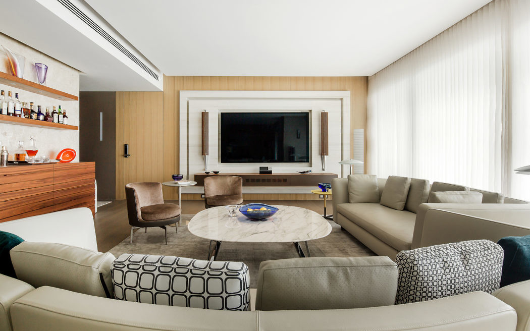 Elegant living room with neutral tones and minimalist decor.
