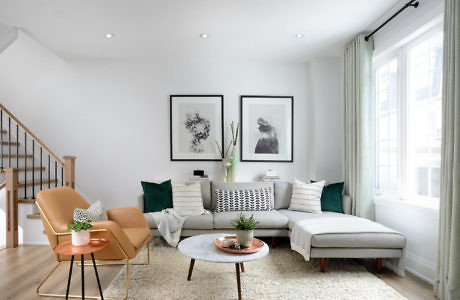 Contemporary living room with neutral tones and minimal decor.