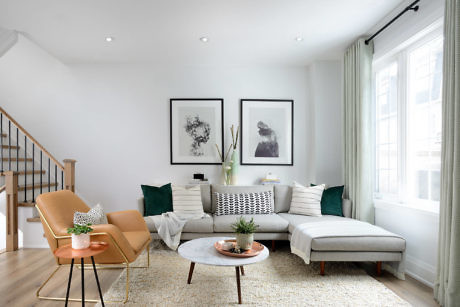 Contemporary living room with neutral tones and minimal decor.