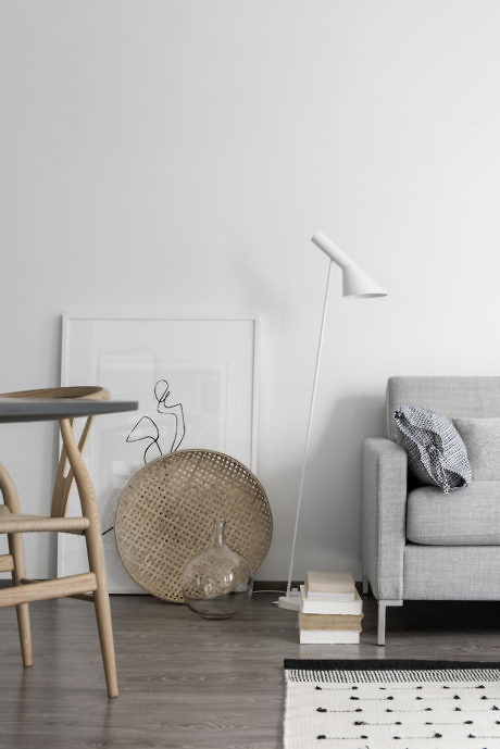 Minimalist living space with neutral tones, clean lines, and simple decor.