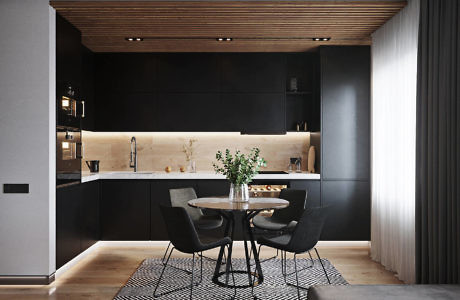 Contemporary kitchen with wood accents and a small dining area.