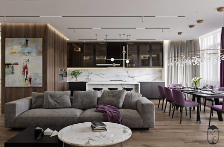 Contemporary living area with plush seating and a sleek kitchen.