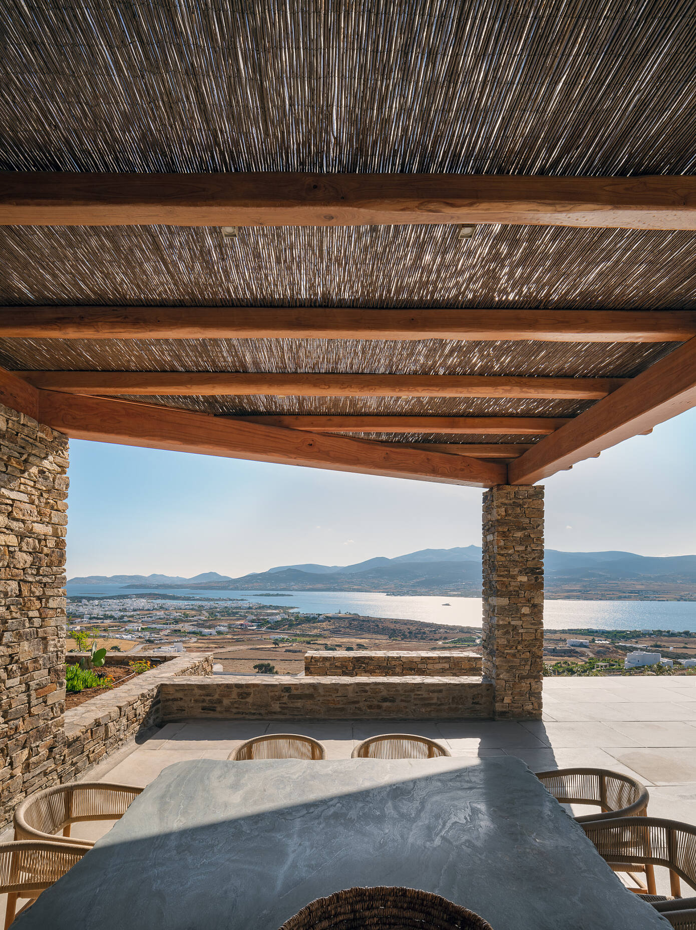 Encaved Stone Villa by Tsolakis Architects