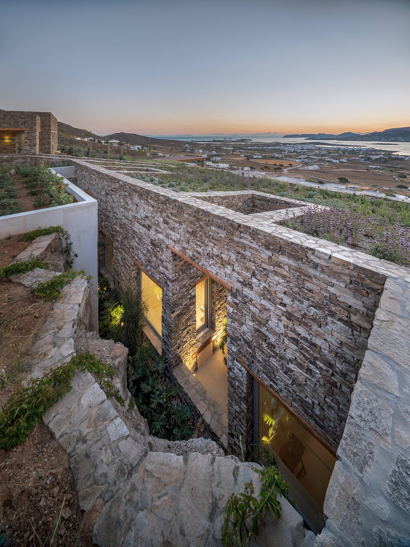 Encaved Stone Villa by Tsolakis Architects