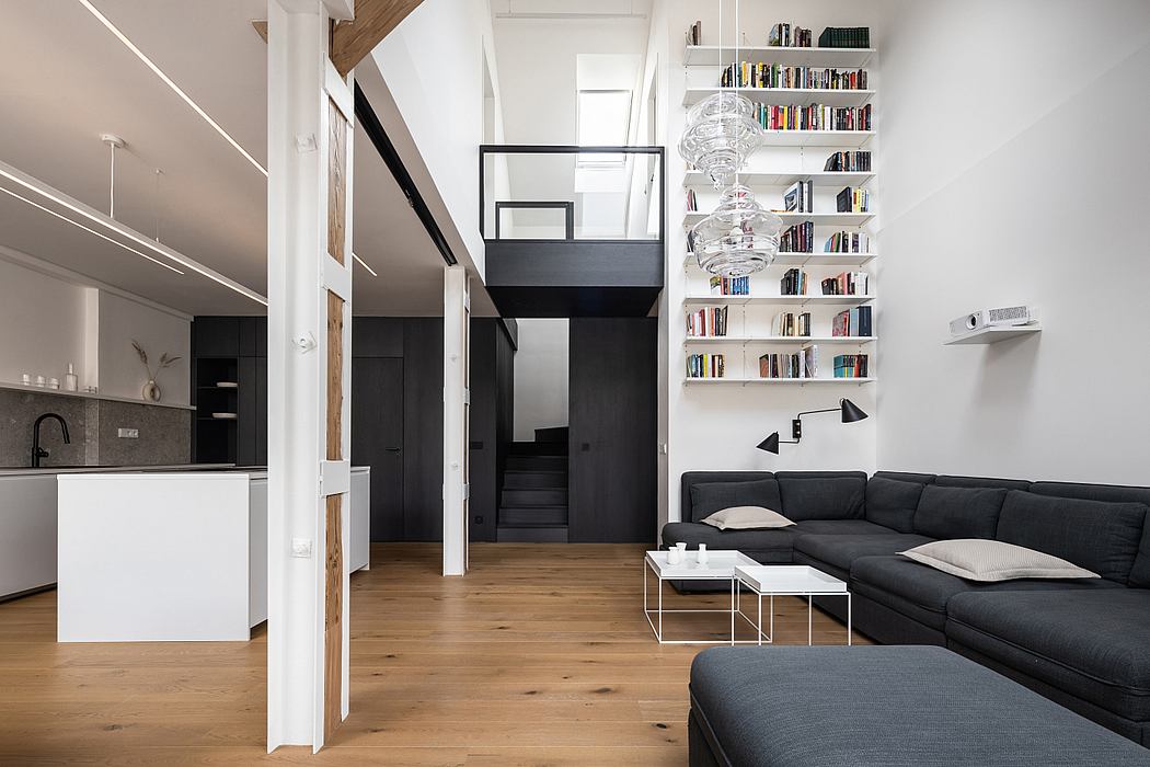 Attic Apartment with a Black Box by Komon Architekti - 1