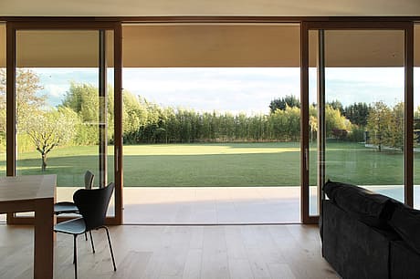 House with a Large Porch by Marco Baldassa - 4