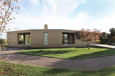 House with a Large Porch by Marco Baldassa - 9