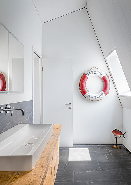 House on Slope by Skarka Studios - 7