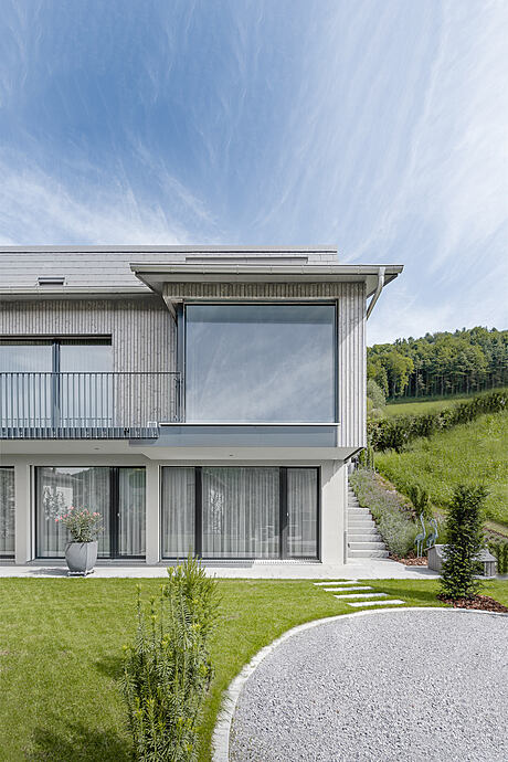 House on Slope by Skarka Studios - 2