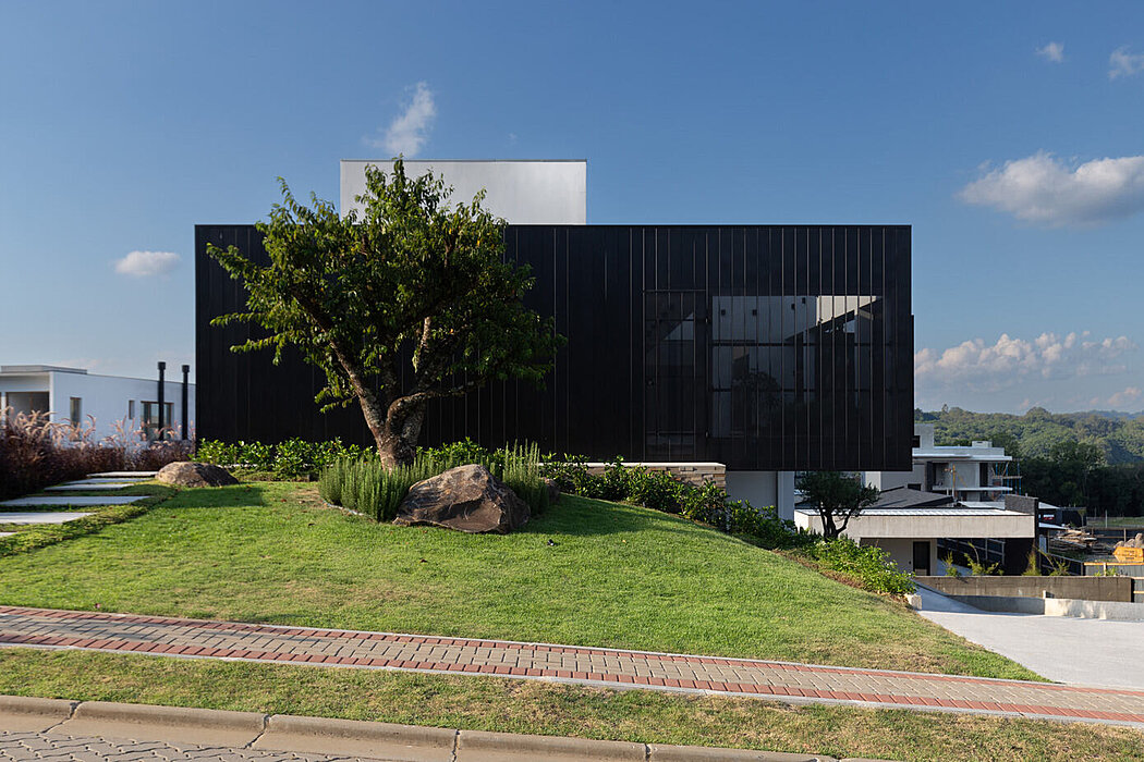 PH2: A Modern Home with Industrial-Inspired Design