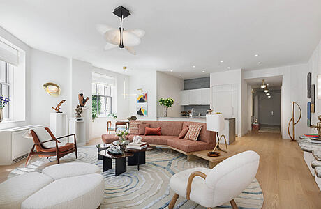 Bright, modern living room with sleek furniture, statement lighting, and contemporary artwork.