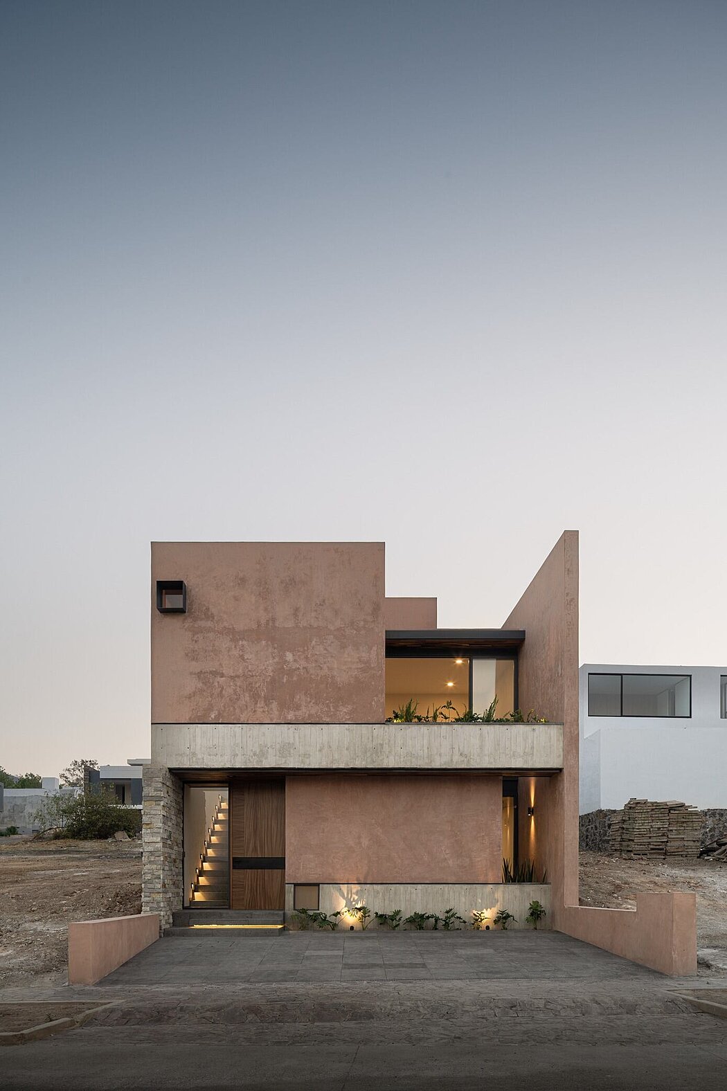 Casa Monolito: Where Earthy Tones Meet Modern Design - 1
