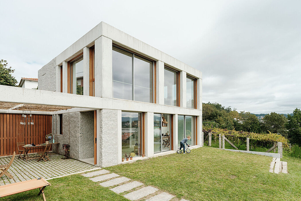 House in Carabuxeira: Fusion of Modern Design and Spanish Charm