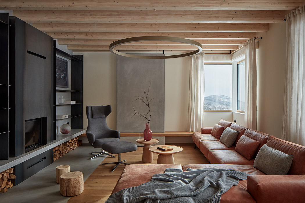 Cozy living room with wooden features and modern furniture.