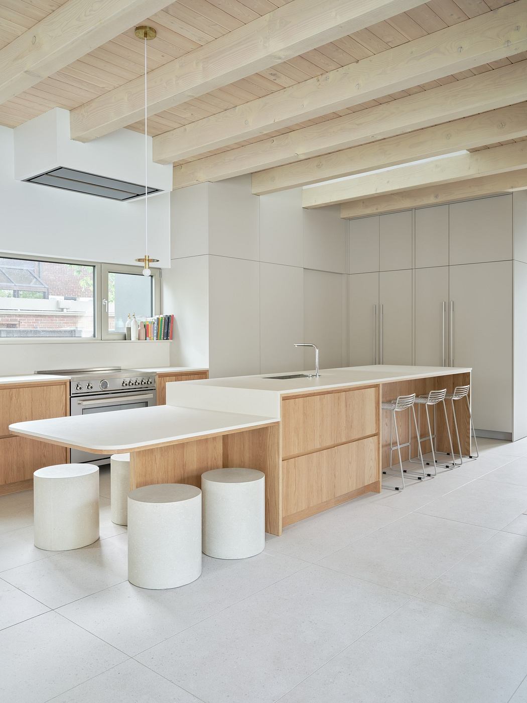 Modern kitchen interior with wooden features and minimalist design.