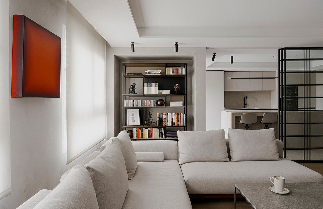 Contemporary living room with minimalist decor and neutral tones.