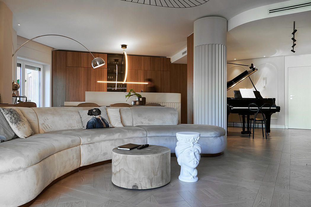 Modern living room with sectional sofa, grand piano, and elegant decor.