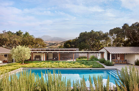 Modern house with pool and mountain view.