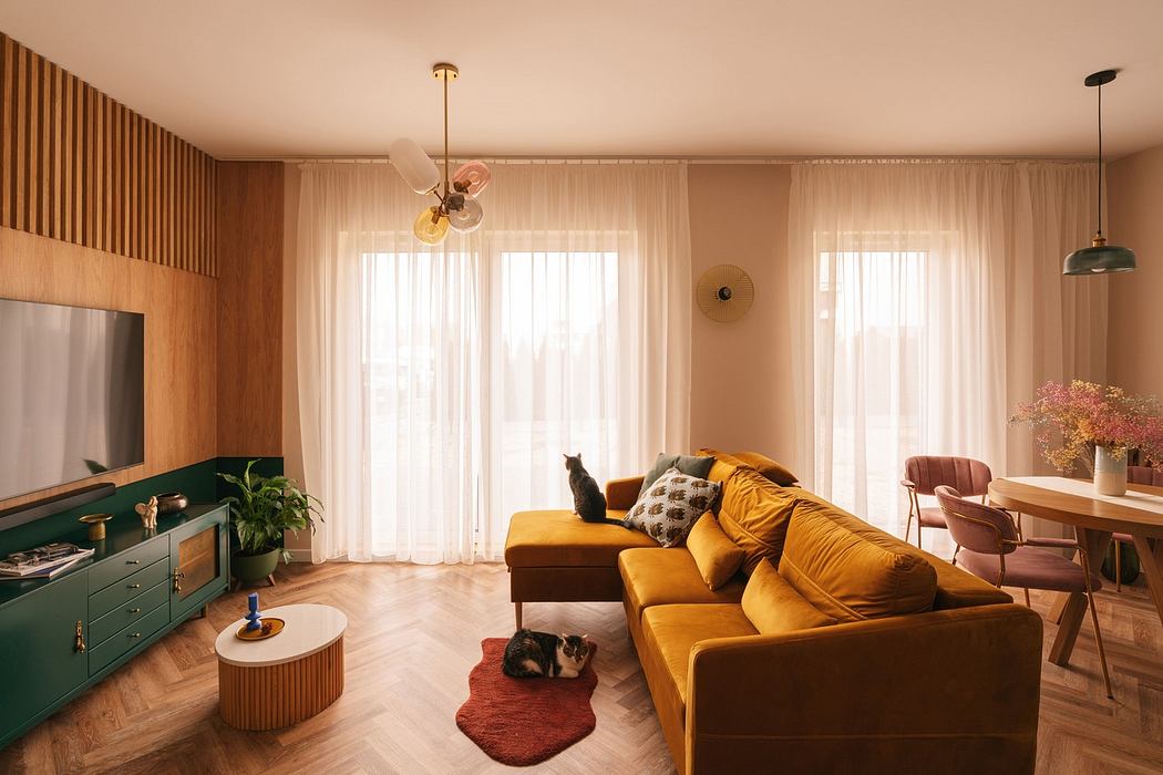 A cozy living room with a mustard sofa, wooden accents, and two cats.