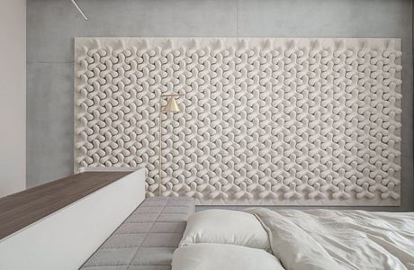 Contemporary bedroom with textured 3D wall panel and minimalist decor.