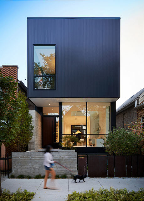 House 1909: Integrating Metal Clad Boxes for Chic Living