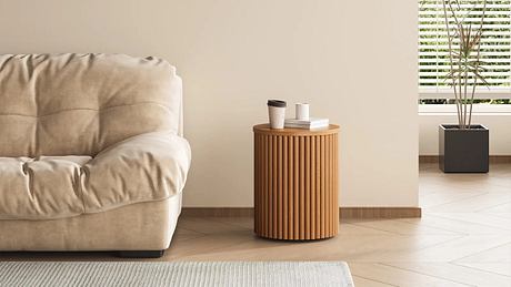 Contemporary living room with a beige sofa and a ribbed side table.