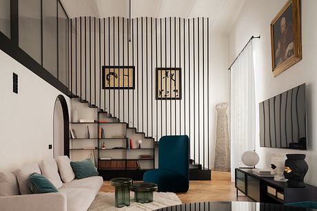 Modern living room with minimalist stairs and chic decor.