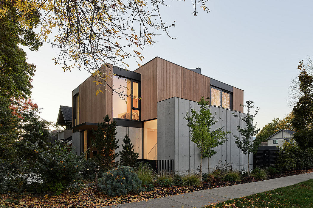 Contemporary house with angular design and mixed-material facade.