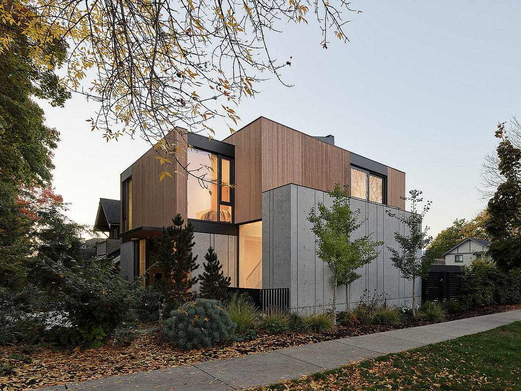 Contemporary house with angular design and mixed-material facade.