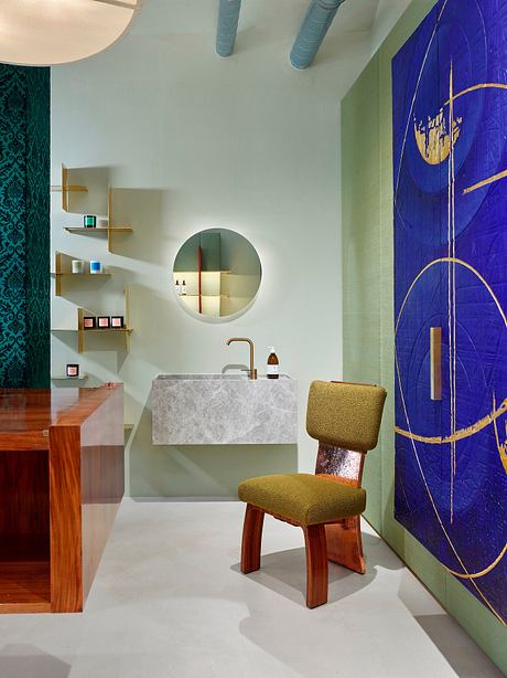 A modern bathroom with a circular mirror, shelves, and a statement blue curtain.