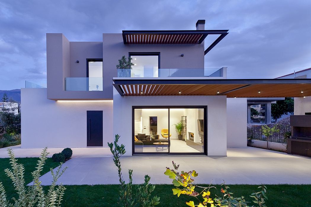 Modern architectural home with clean lines, wood accents, and expansive windows overlooking landscaped yard.