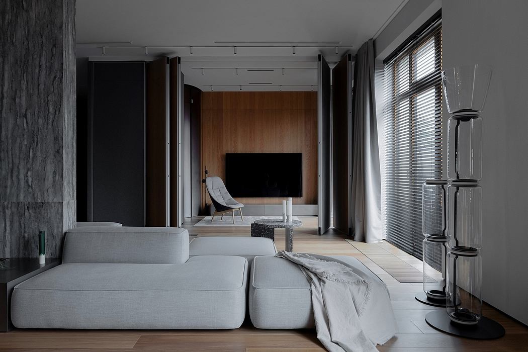 Sleek, modern interior with minimal furnishings, wood paneling, and minimalist decor.