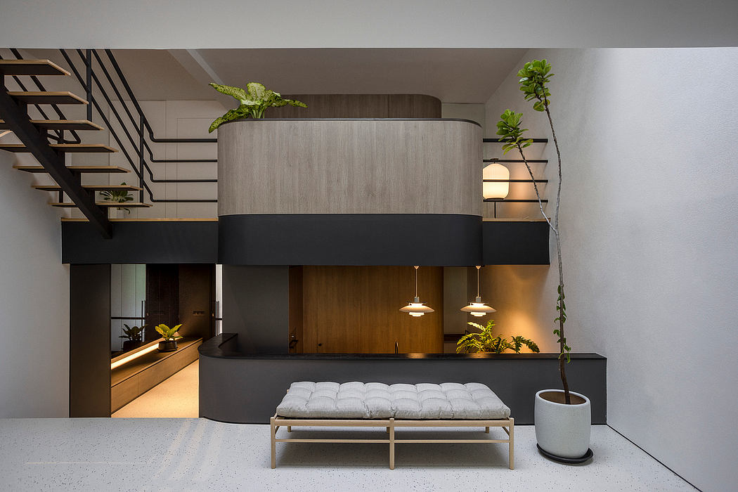 Sleek, modern interior with minimalist design elements, integrated greenery, and warm lighting.