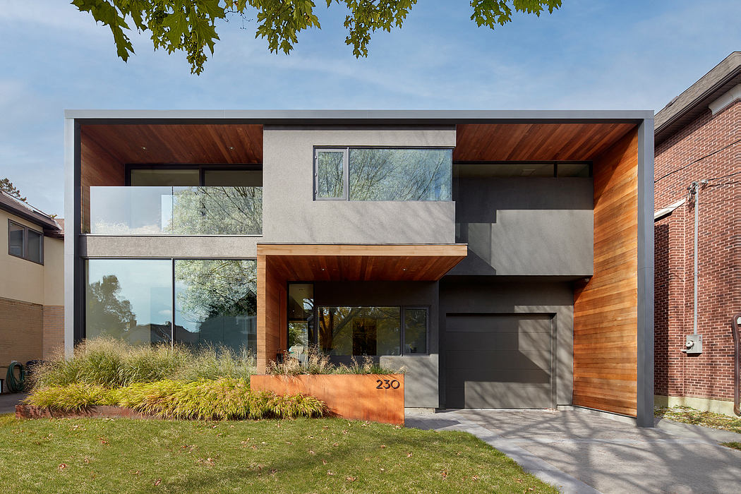 Contemporary home with wooden accents, expansive windows, and a minimalist design aesthetic.
