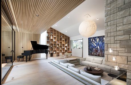 Spacious living room with tall wooden ceiling, custom bookshelf, piano, and modern art.