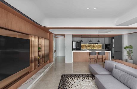 Sleek, modern interior with wooden cabinetry, tile flooring, and built-in shelving.