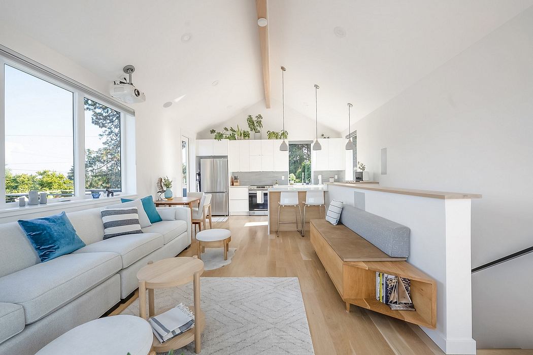 Bright, open-concept living space with clean, modern furnishings and natural wood accents.