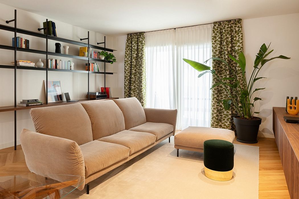 Cozy living room with beige sofa, shelving unit, and tropical plant accents.