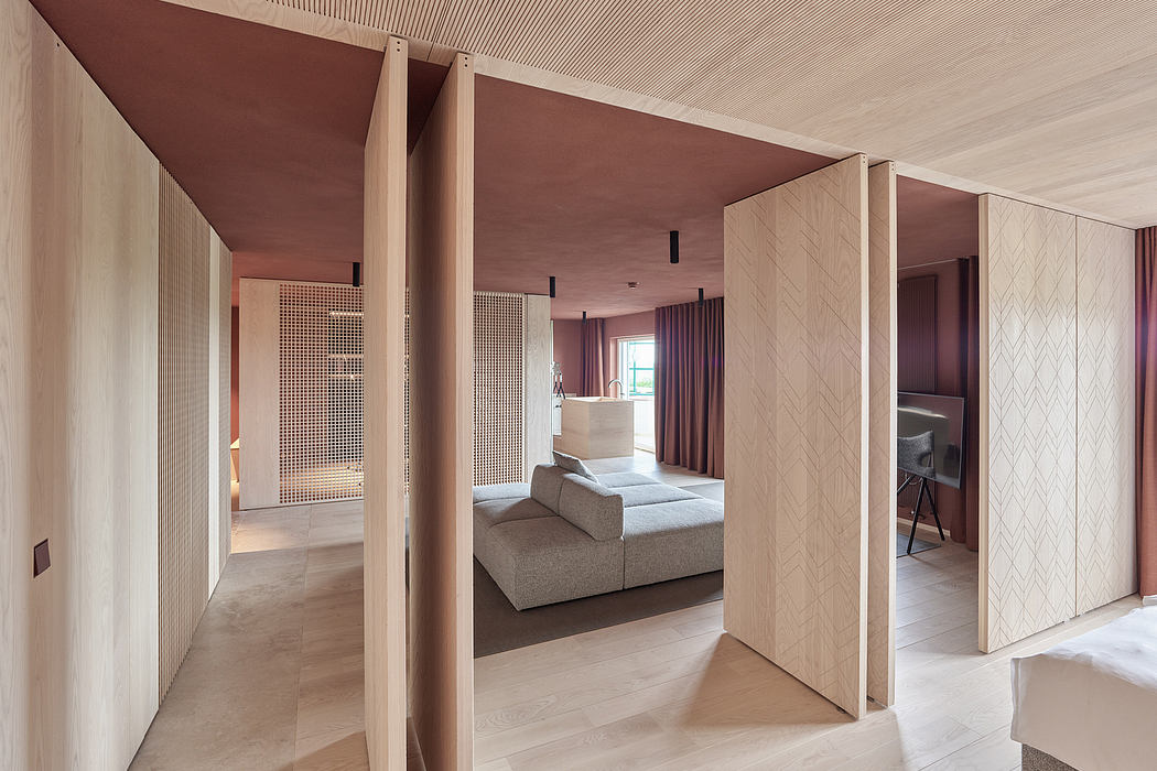 Sleek, minimalist interior with warm wood tones, clean lines, and modern furnishings.