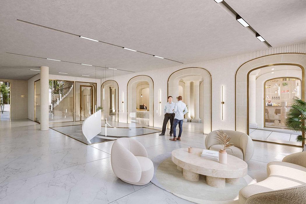 Modern marble lobby with arched entryways, curved furnishings, and tall column details.